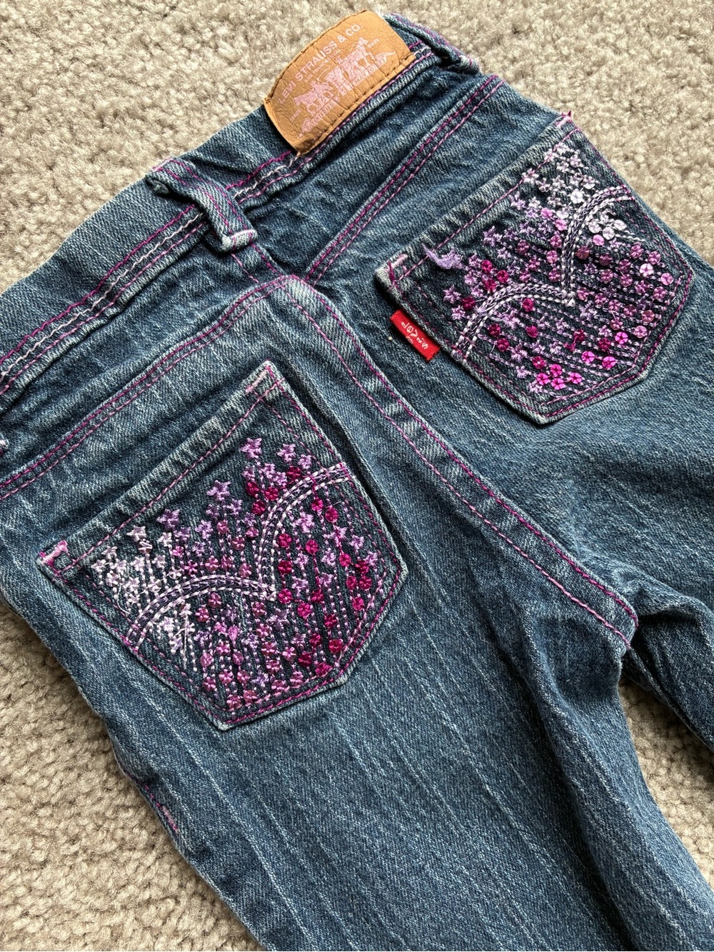 Levi's Women's Dark Blue Skinny Jeans with Pink Embroidered Pockets